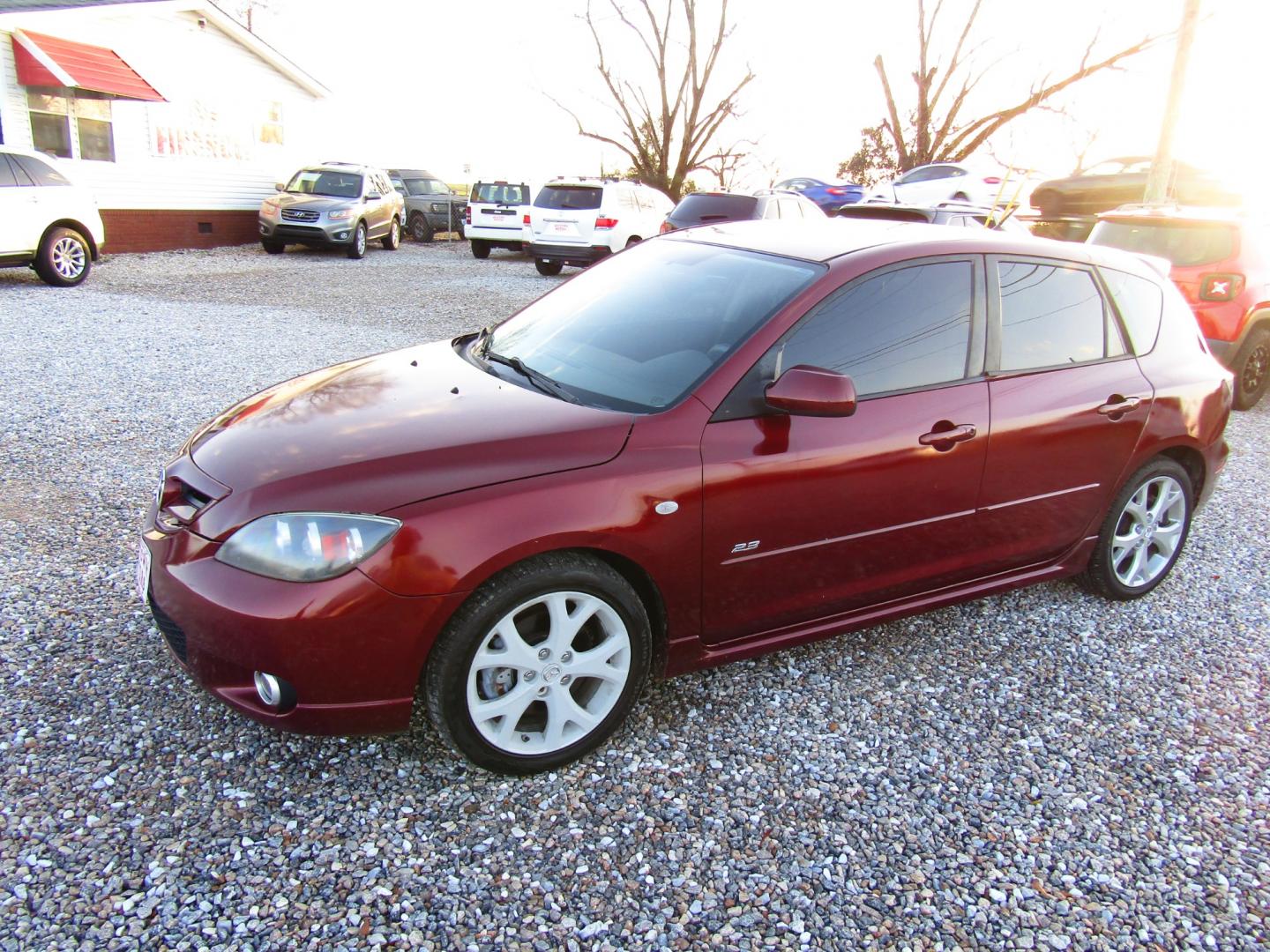 2008 Red Mazda MAZDA3 s Grand Touring 5-Door (JM1BK343481) with an 2.3L L4 DOHC 16V engine, Automatic transmission, located at 15016 S Hwy 231, Midland City, AL, 36350, (334) 983-3001, 31.306210, -85.495277 - Photo#2